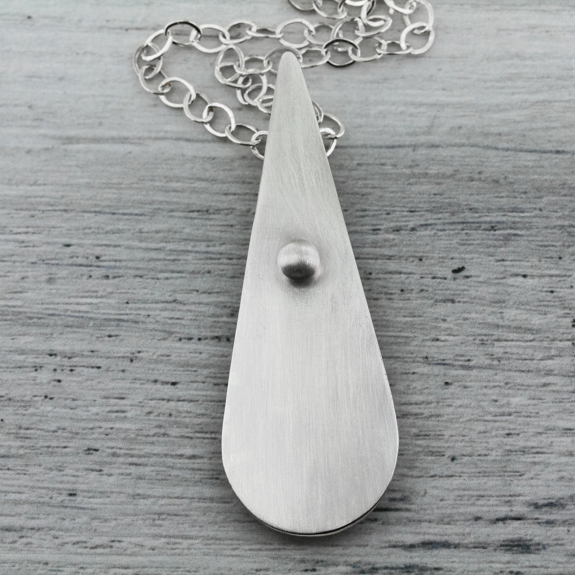 Minimalist sterling silver teardrop shaped necklace