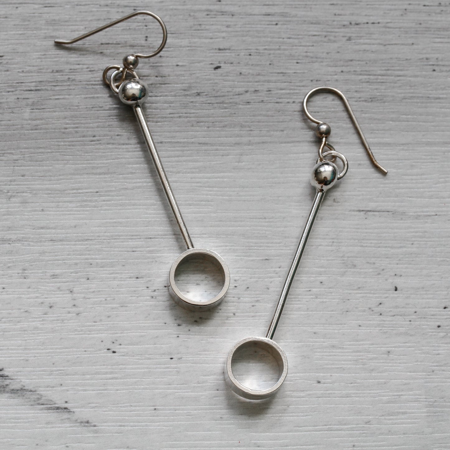 Minimalist and geometric circles sterling silver earrings.
