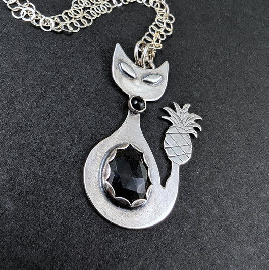 Sterling silver handmade cat with pineapple tail and rosecut onyx