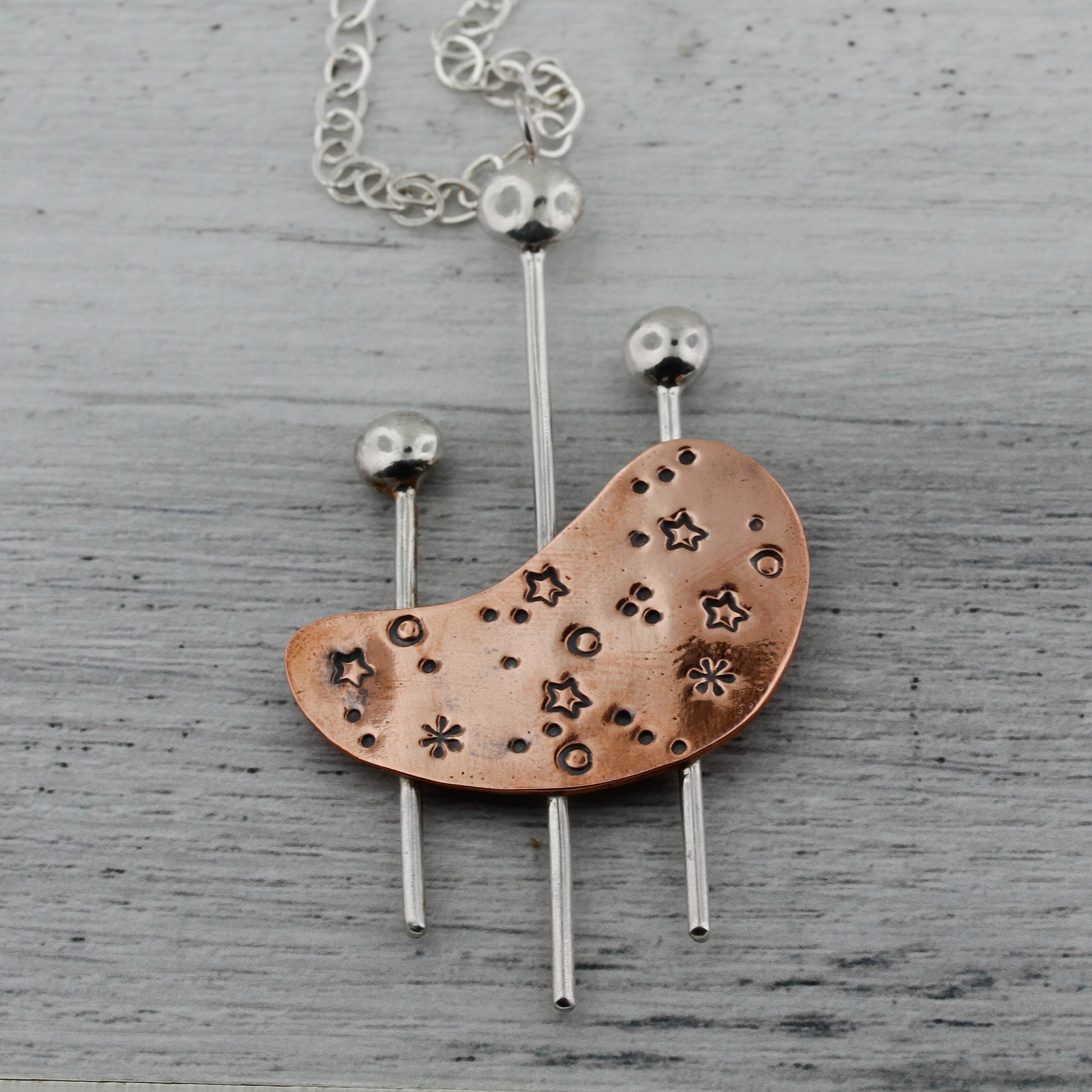 Modernist kidney shaped necklace in mixed metals