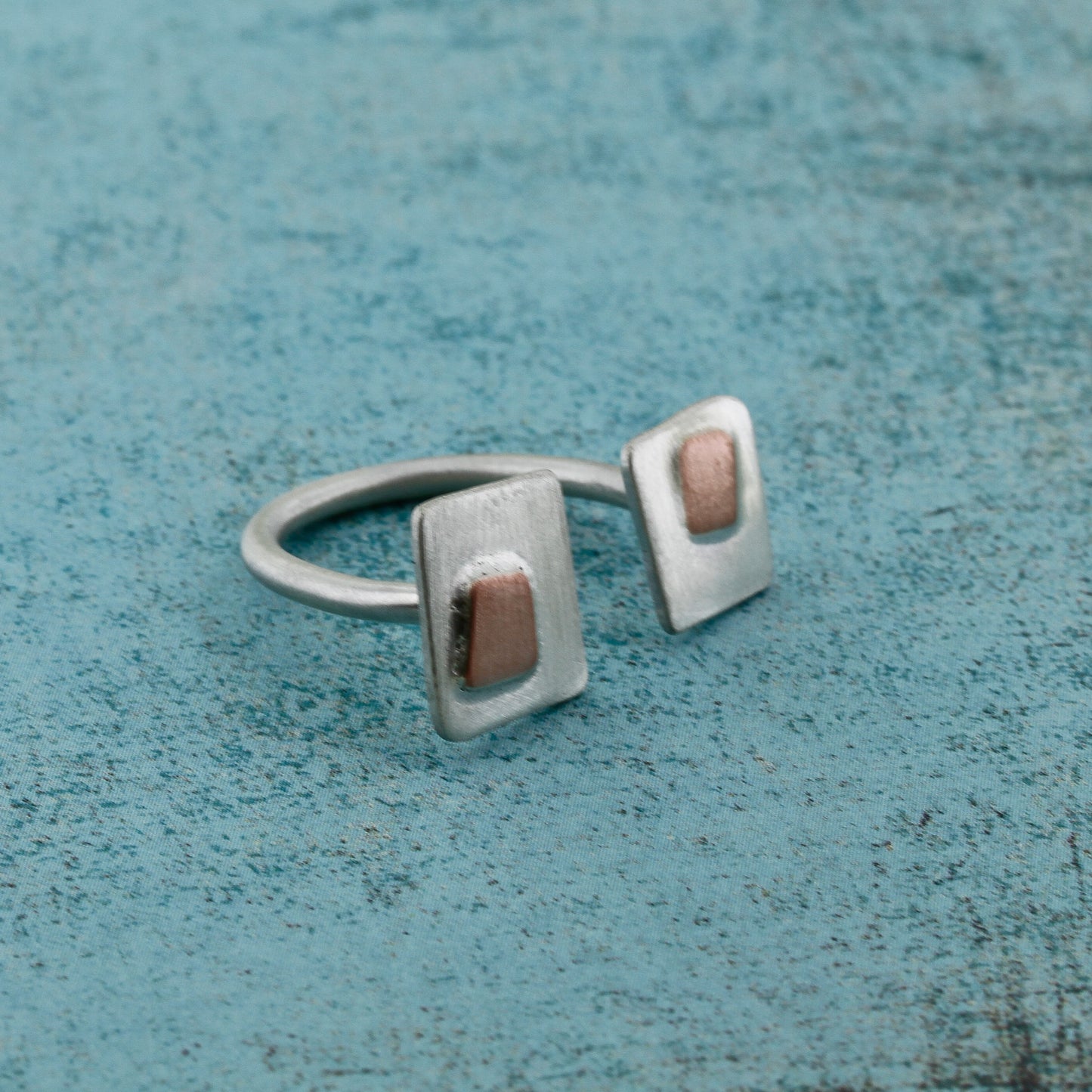 In between the finger ring inspired by mid century design