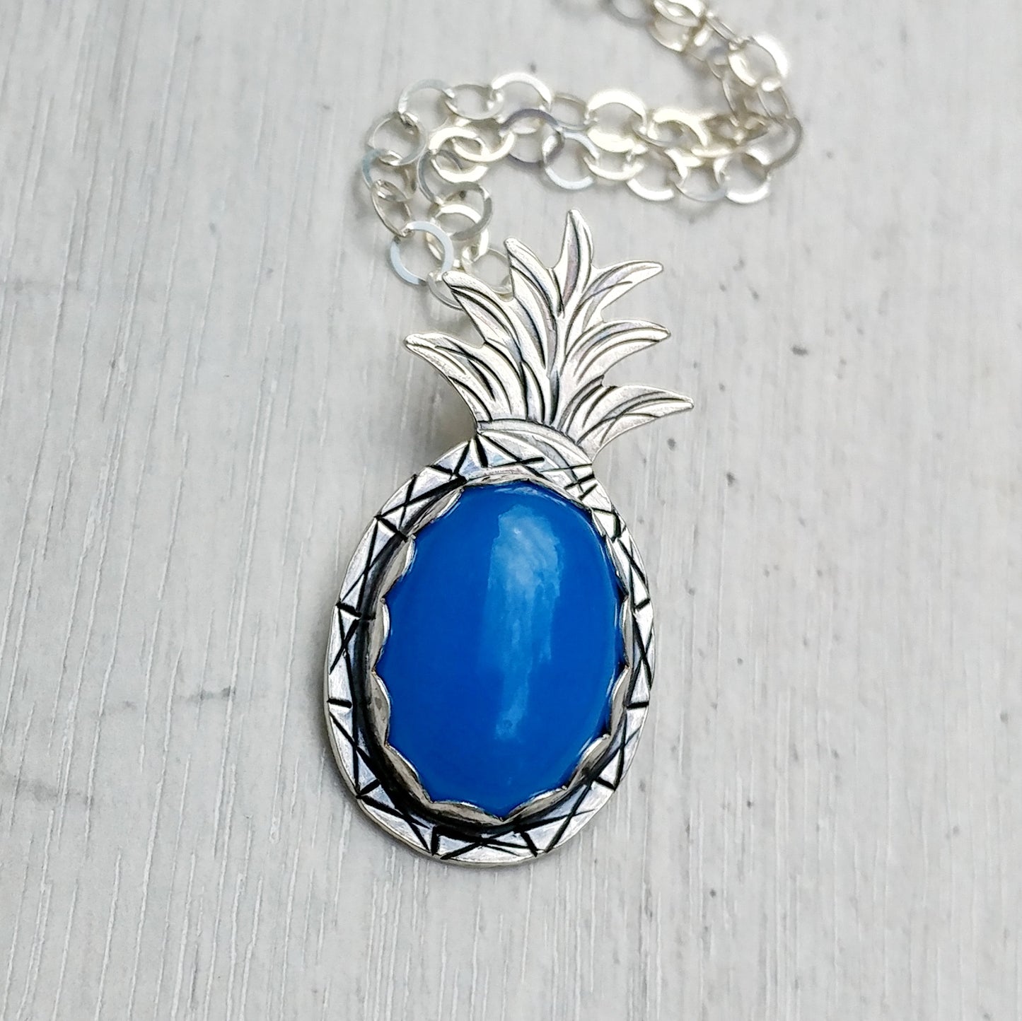 Sterling silver pineapple necklace with blue agate stone