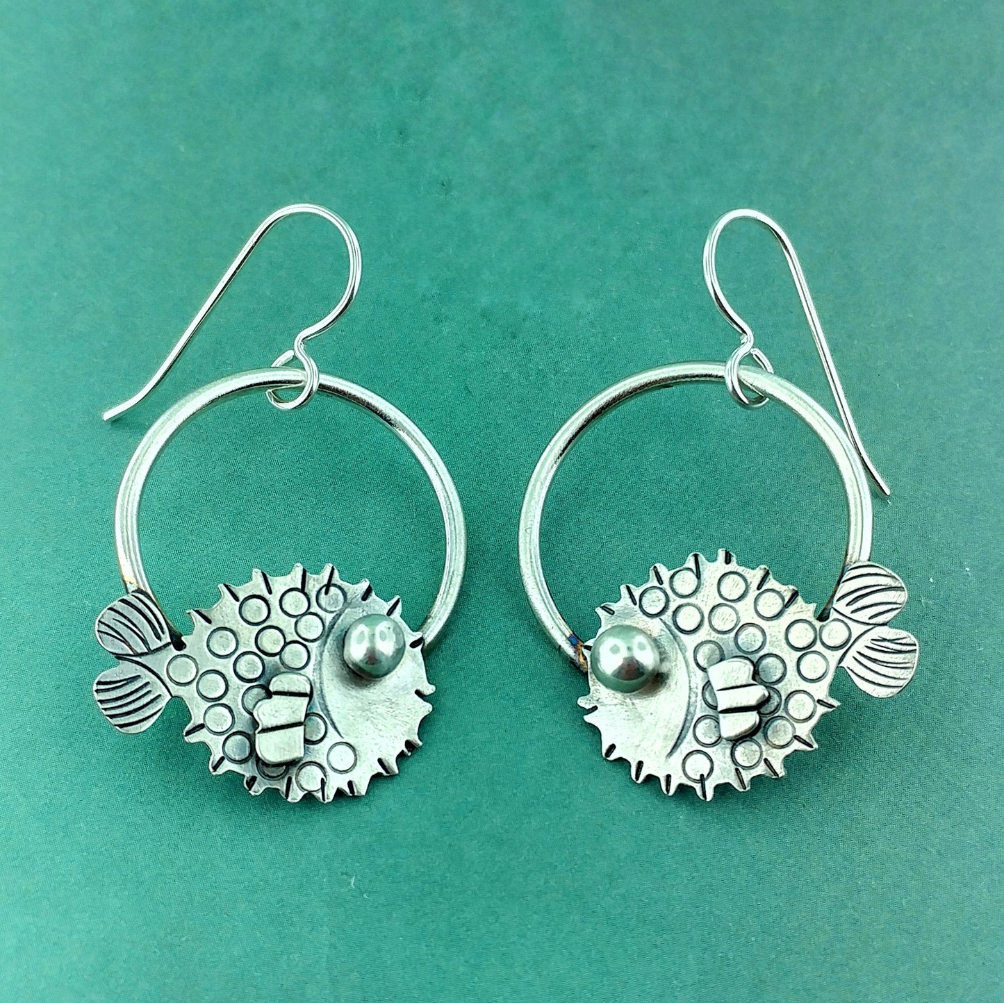 Puffer fish earrings made in sterling silver