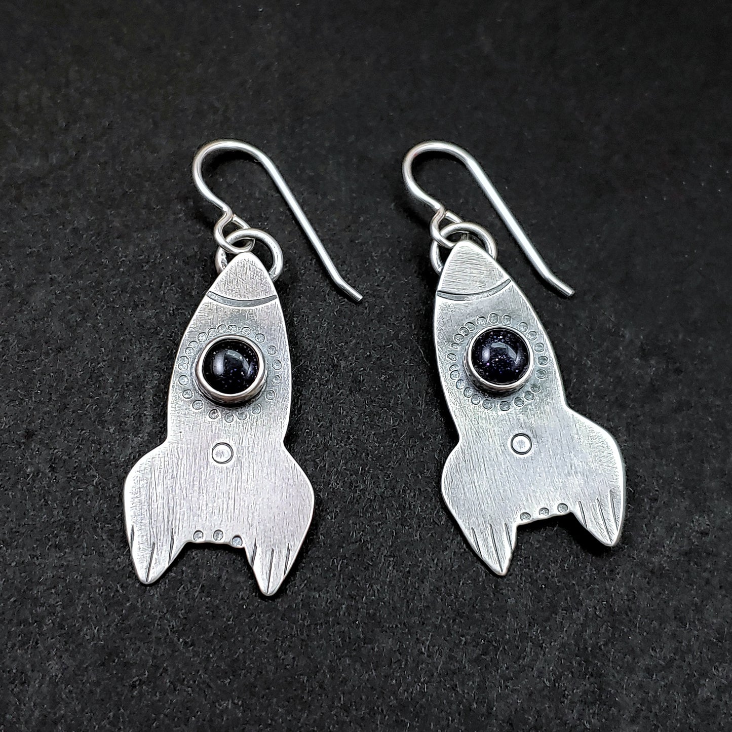 Sterling silver rocket ship earrings with blue goldstone