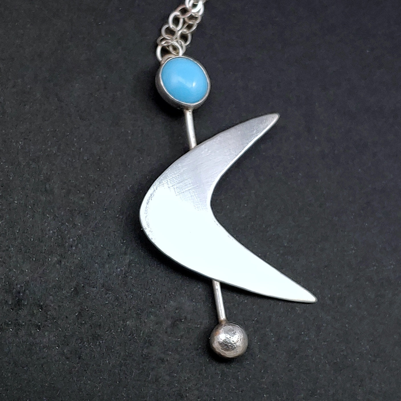 Sterling Silver Boomerang with Light Blue Vintage Glass Cabochon