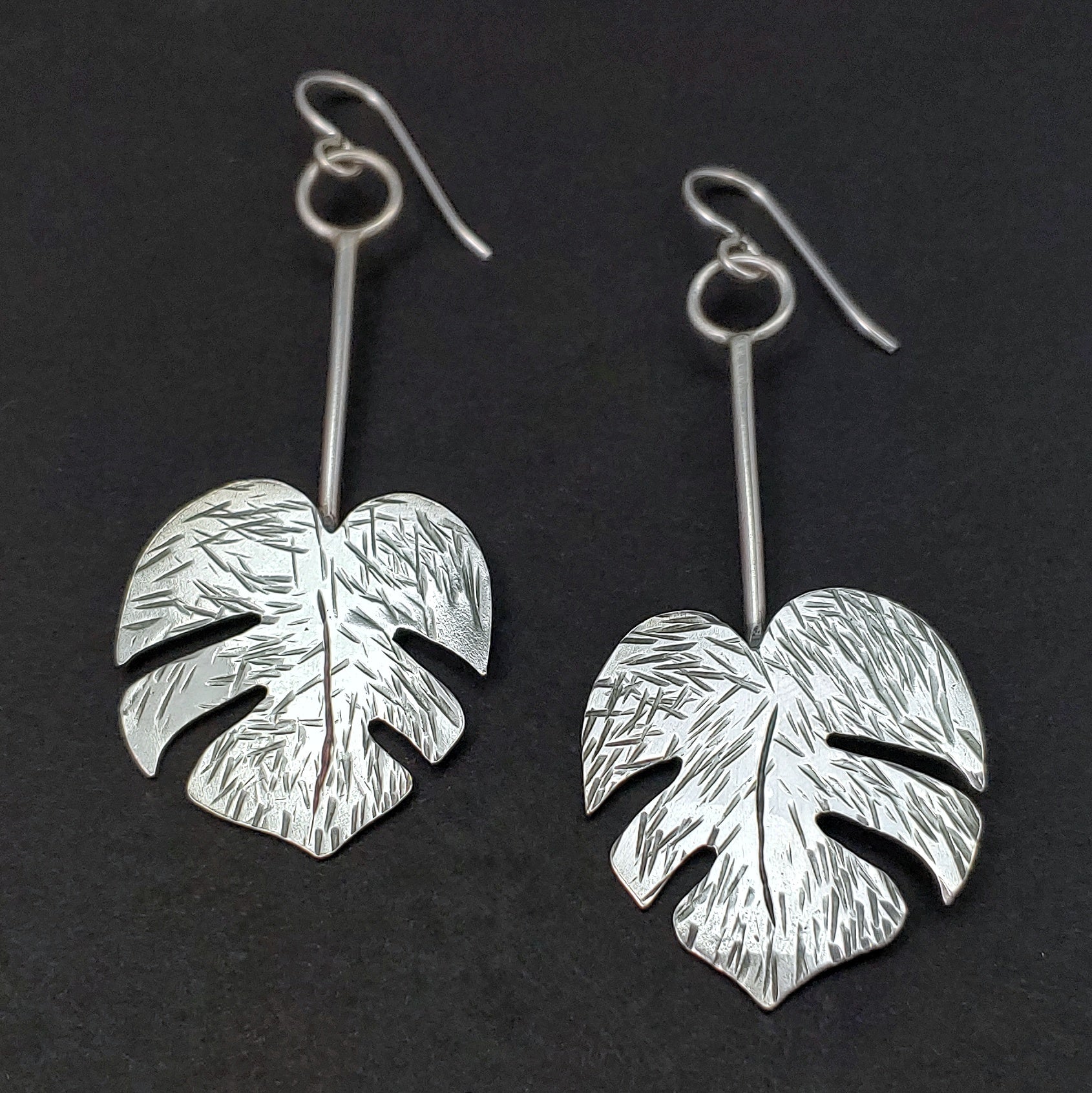 handmade sterling silver monstera leaf earrings tiki