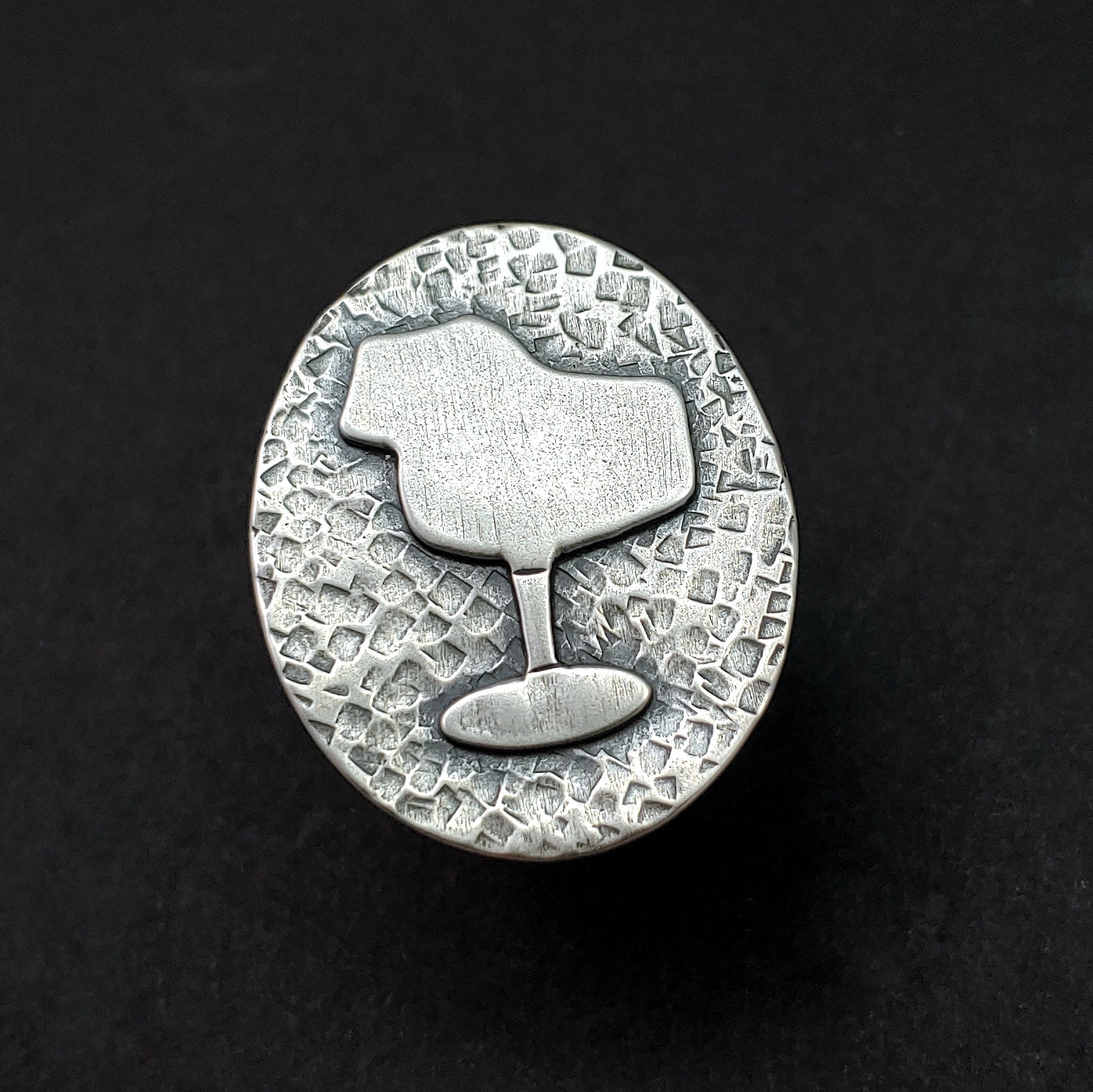 Front view of sterling silver tulip chair ring