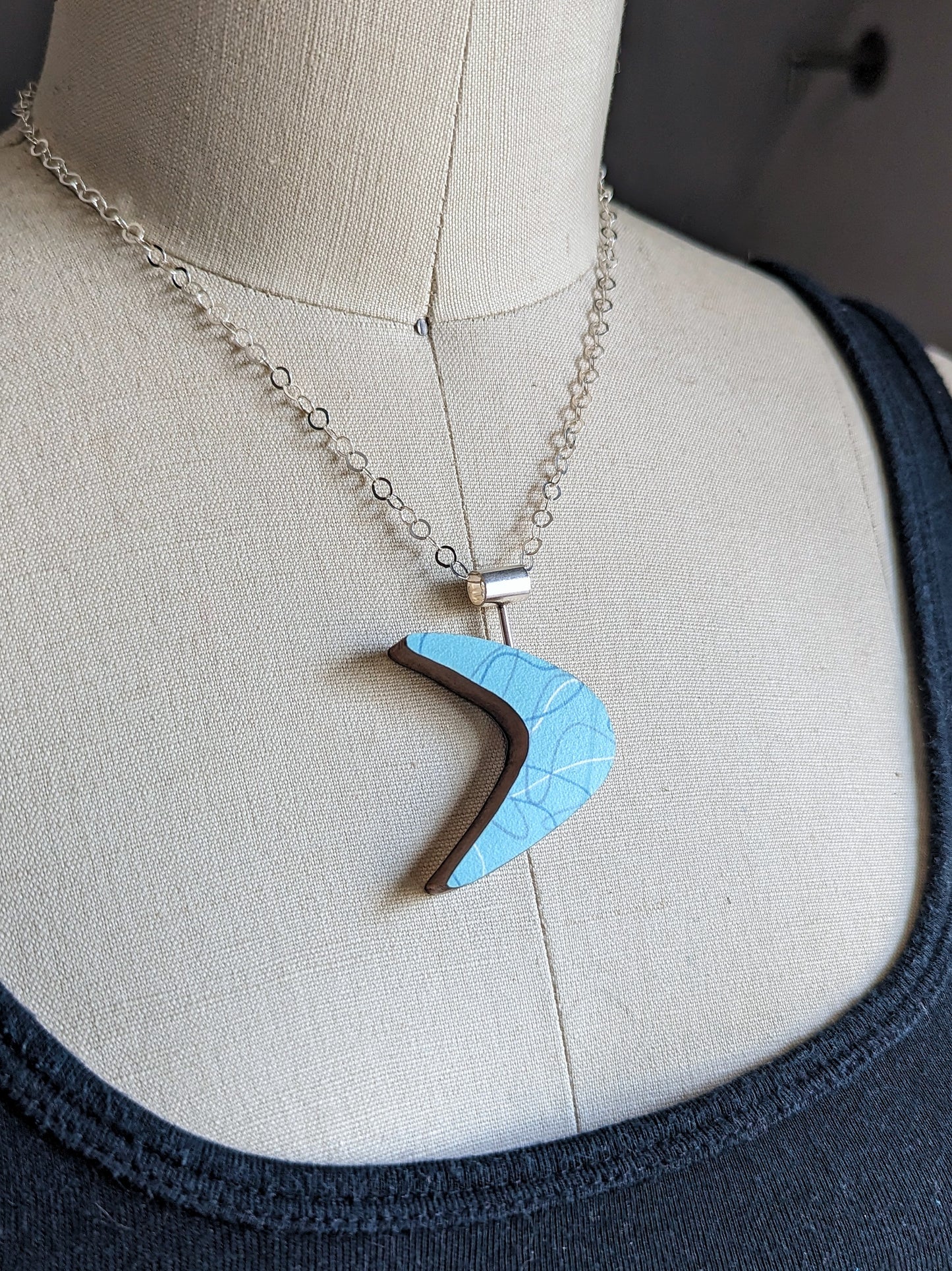 Boomerang Shaped Reversible Laminate Necklace - Light Teal